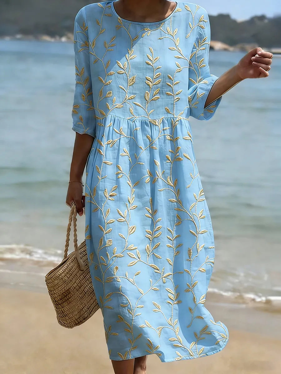 Karla – Blaues Strandkleid mit Blumen – Bild 1